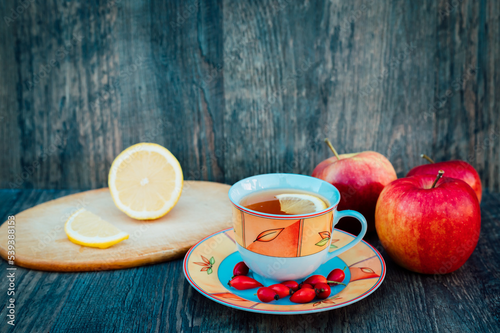 Rosehip tea with lemon and apples. Autumn Healthy Tea for Health Rosehip tea with lemon and apples. Autumn Healthy Tea for Health