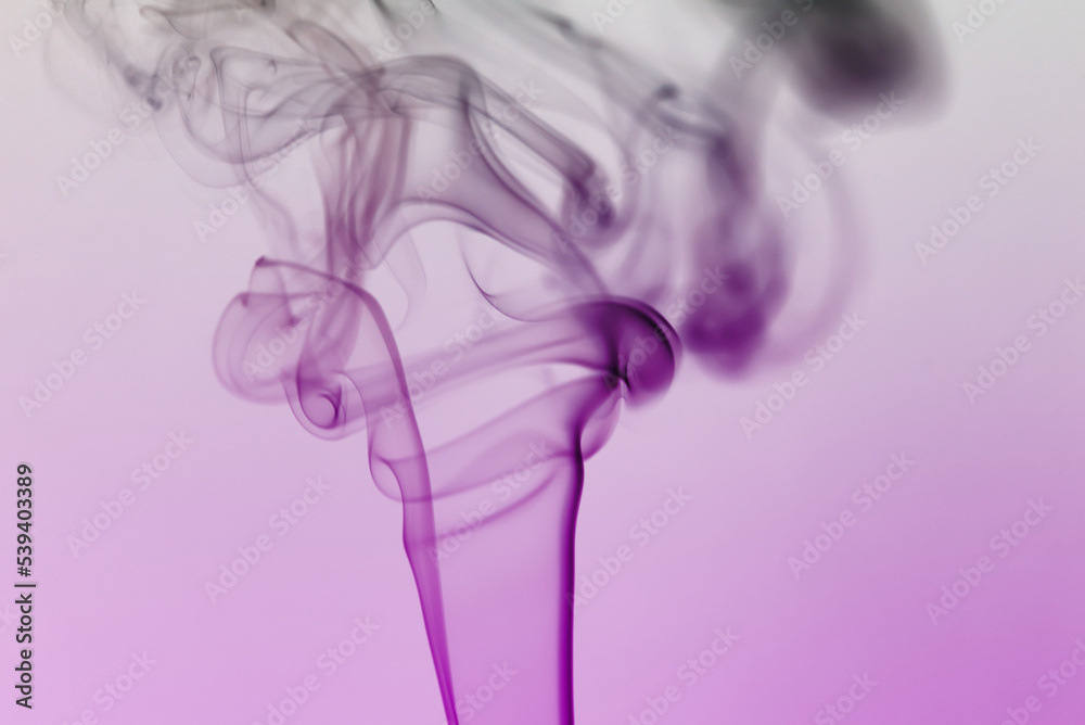 Beautiful scenic smoke of incense stick against purple background. Photo taken October 17th, 2022, Zurich, Switzerland. Beautiful scenic smoke of incense stick against purple background. Photo taken October 17th, 2022, Zurich, Switzerland.
