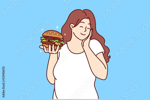 Happy overweight woman holding burger excited about fast food. Smiling fat girl eating fatty unhealthy hamburger. Diet and nutrition. Vector illustration. 