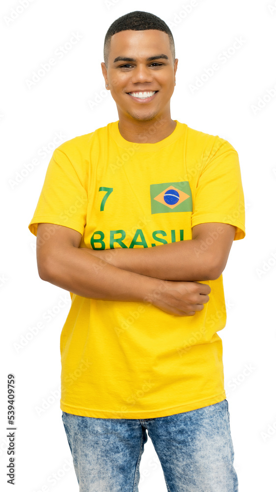 Handsome brazilian foorball fan with yellow jersey Handsome brazilian foorball fan with yellow jersey