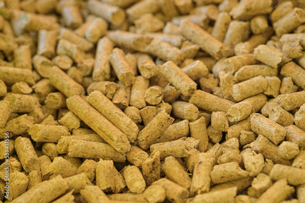 Close up view of stove fuel pellets material, winter home heating Close up view of stove fuel pellets material, winter home heating