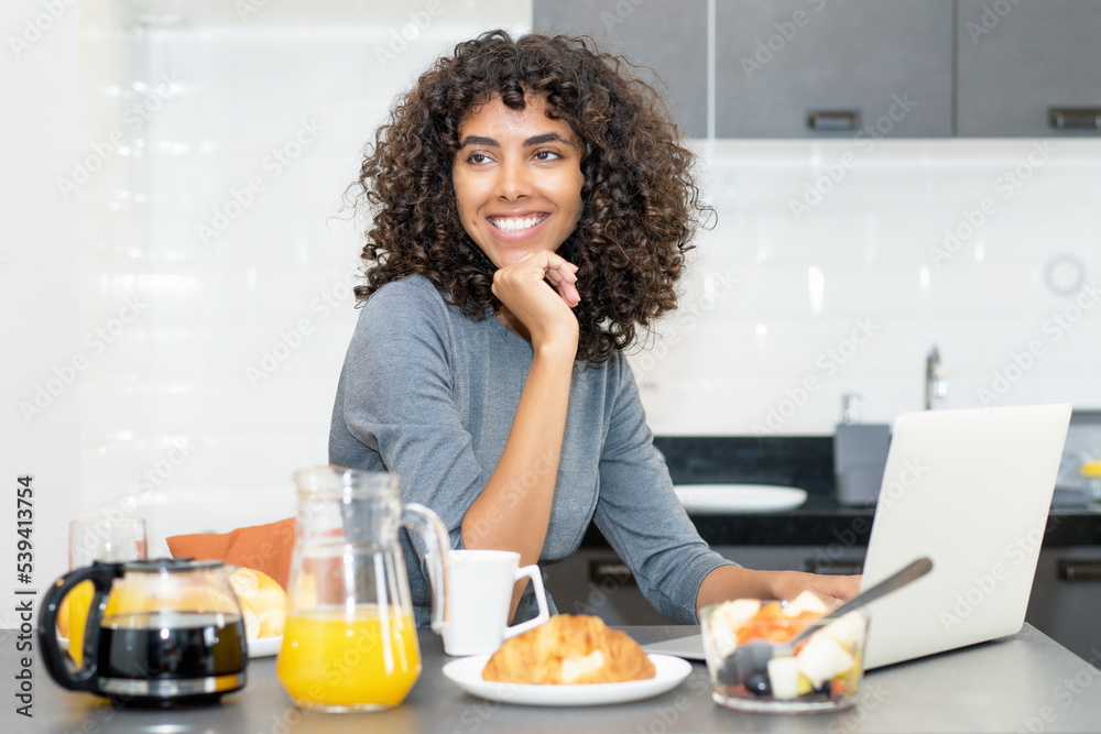 Latin american woman working at computer