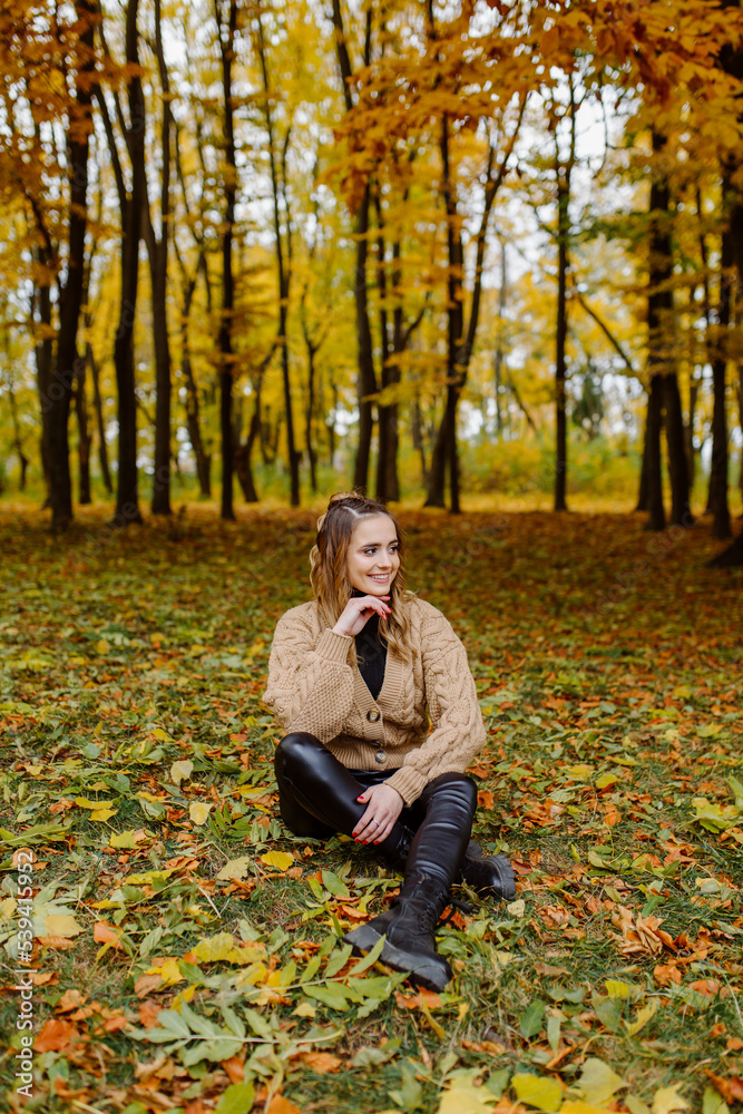 Woman walking in the autumn park, a healthy lifestyle, walk, exercise Woman walking in the autumn park, a healthy lifestyle, walk, exercise