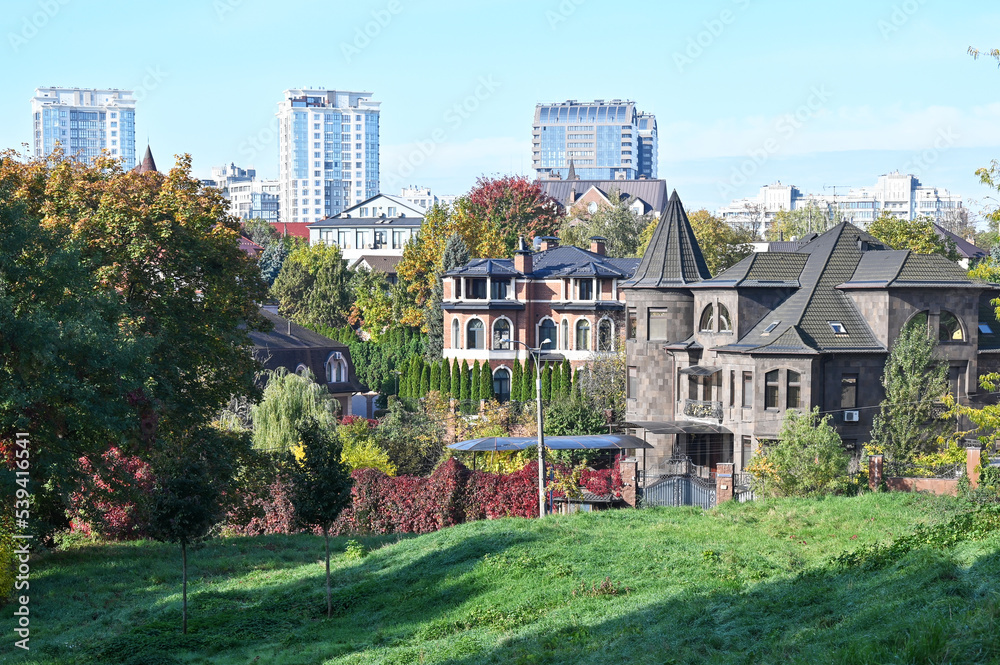 View from the botanical garden on modern houses in the city of Kyiv View from the botanical garden on modern houses in the city of Kyiv