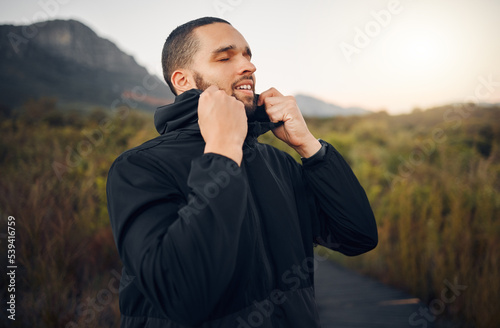 Man breathing in nature, mountain forest peace and spiritual wellness meditation in Canada winter. Calm breathe of fresh air, natural outdoor freedom of faith and relax in fresh green trees in woods