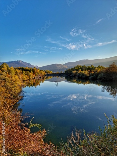 Autumn landscape with lake and mountain