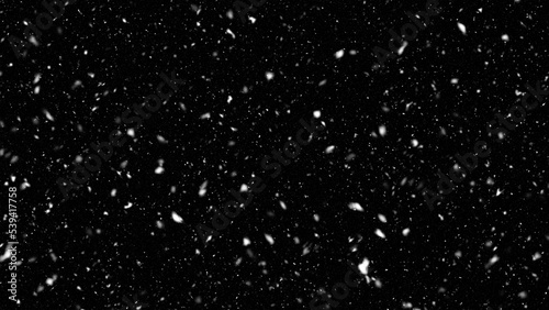 Falling realistic natural snowflakes overlay from top to bottom, calm snow for digital composition. Falling snow isolated on black background