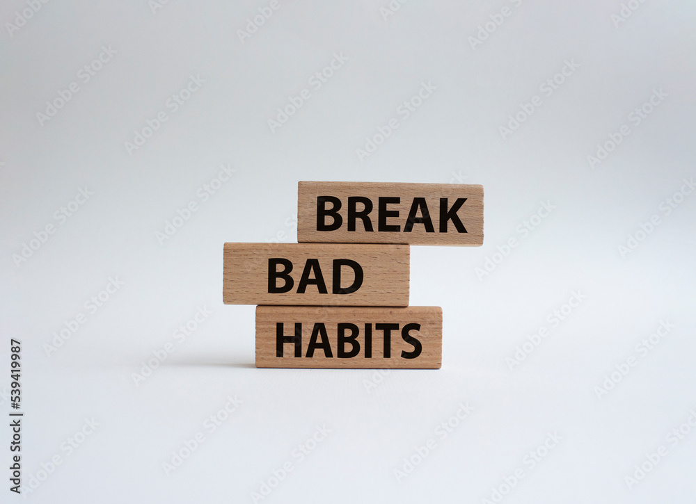 Break bad habits symbol. Concept words Break bad habits on wooden blocks. Beautiful white background. Medicine and Break bad habits concept. Copy space. Break bad habits symbol. Concept words Break bad habits on wooden blocks. Beautiful white background. Medicine and Break bad habits concept. Copy space.