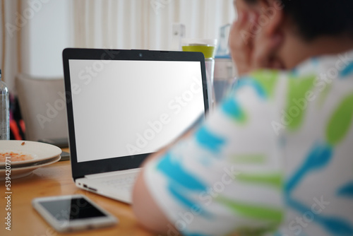 foreground blur kid watch mock up screen laptop computer on table