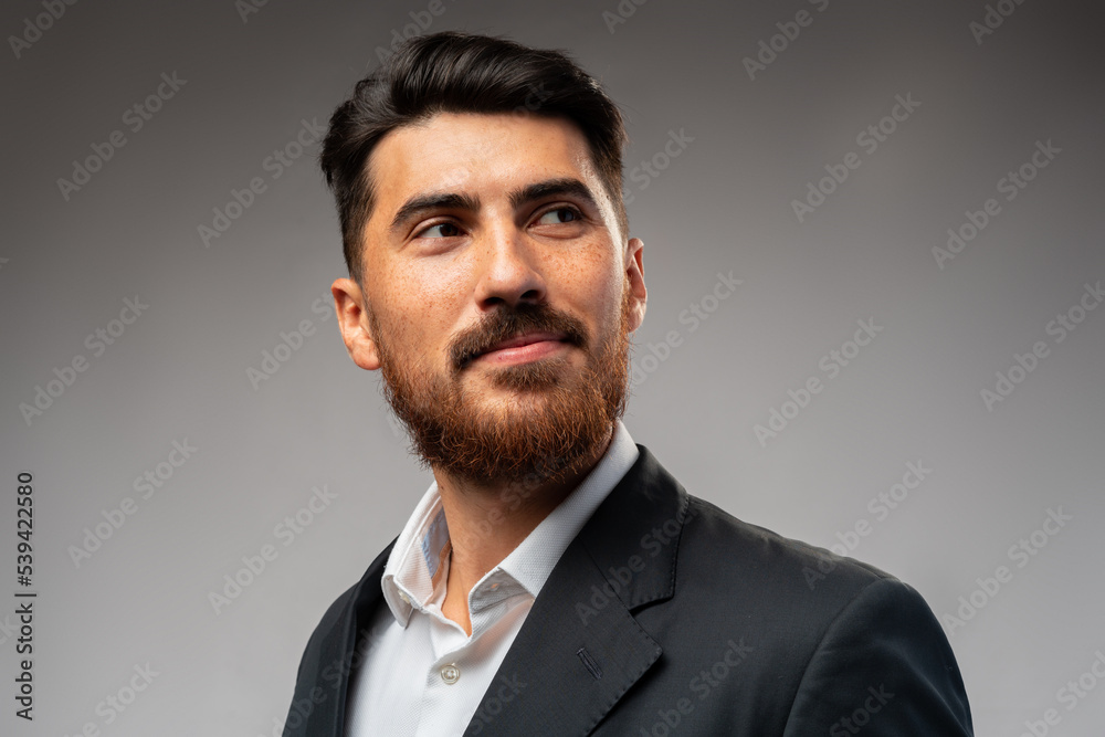 Portrait of handsome confident business on gray background Portrait of handsome confident business on gray background