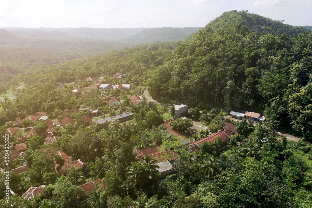 residents' homes under the foot of mountains and forests - aerial shot.jpg residents' homes under the foot of mountains and forests - aerial shot.jpg