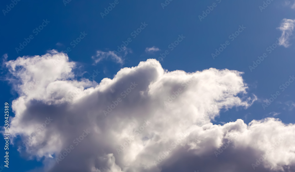 Clouds in dramatic blue sky. Clouds in dramatic blue sky.