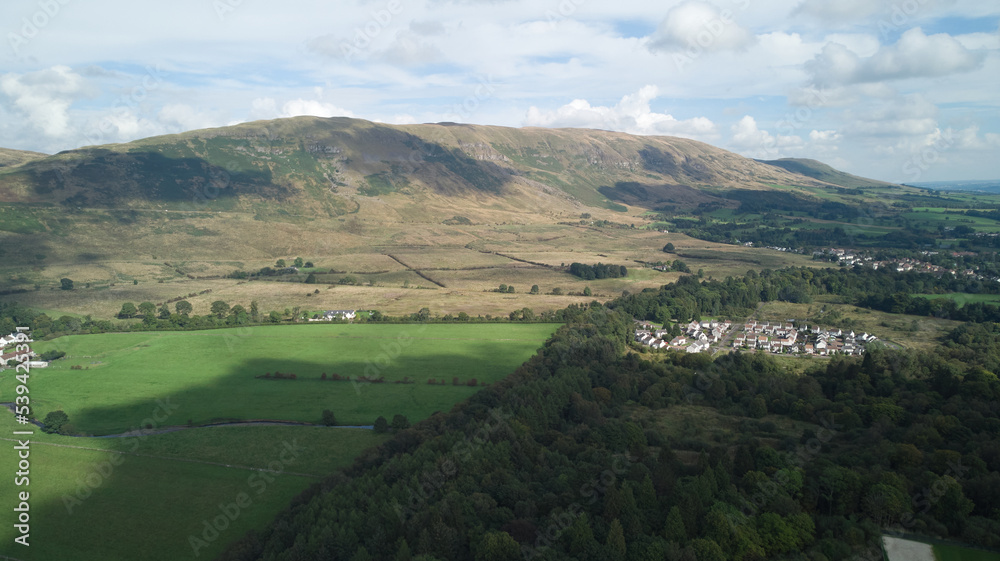 Aerial photo of Scottish green fields and hills in summer