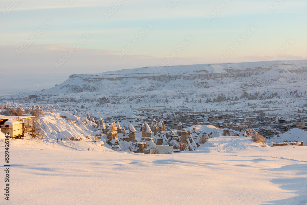 Pigeon Valley and Cave town in Goreme during winter time. Cappadocia, Turkey. 