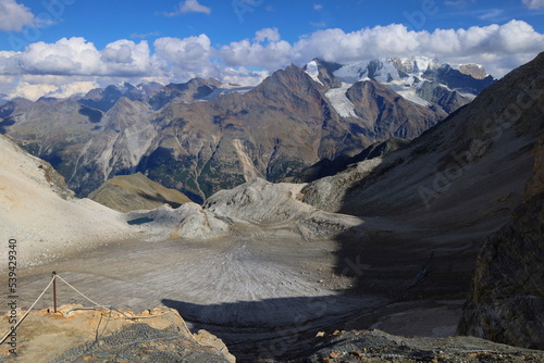 Majestic alpine landscape view of Üssers Barrhorn, Weisshorn and Bishorn covered by Brunegg glaciers in Swiss Alps, Wallis, Switzerland photo