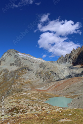 Mountain landscape of long distance hiking trail Tour Des Combins which crosses Switzerland to Italy via Bourg Saint Pierre, Fenetre Durand and Aosta Valley, TDC