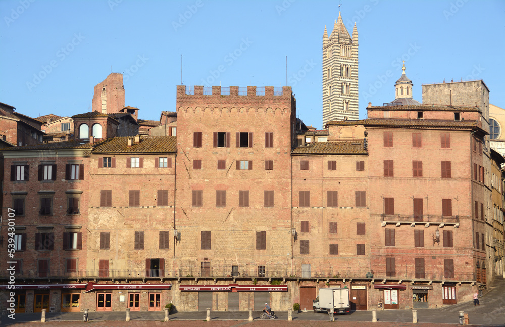 Piazza del Campo is the shell-shaped square where the Palio di Siena takes place. The Palazzo Pubblico and the Torre del Mangia dominate the square towards the Duomo.