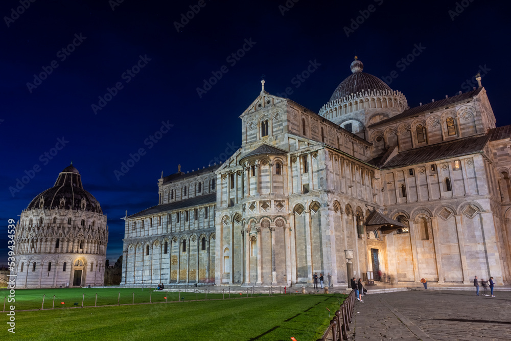 Pisa, Italy, 14 April 2022:  Cathedral and Baptistery by night