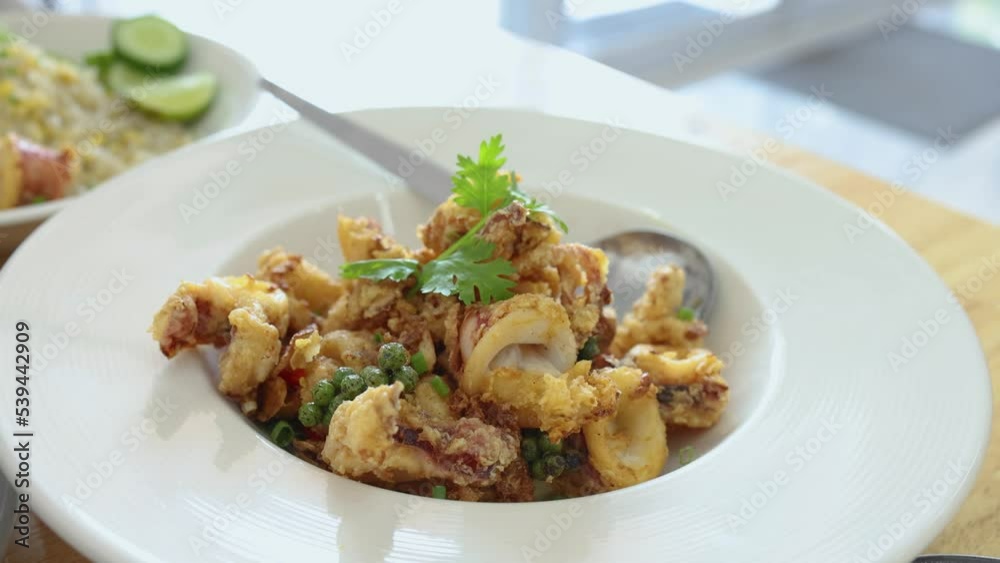 Fried Squid with Crispy Garlic Asian Thai food Fried Squid with Crispy Garlic Asian Thai food