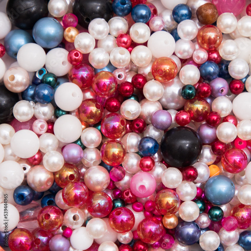 a lot of colorful beads for needlework background