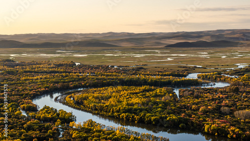 Colorful autumn wetlands at sunset in Hulunbuir, China.