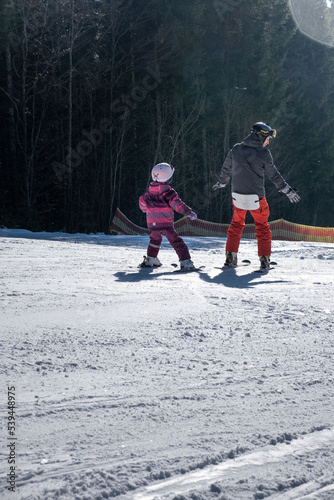 young family at ski slope