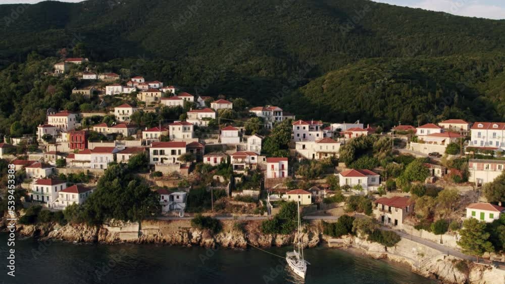 Seaside town in Greece. Aerial view of the seaside town on a sunset.