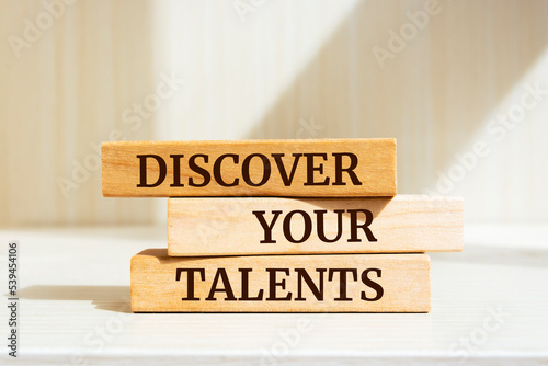 Wooden blocks with words 'Discover Your Talents'.