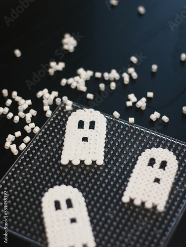 craft ghosts from thermo mosaic plastic. Halloween hand made with kids
