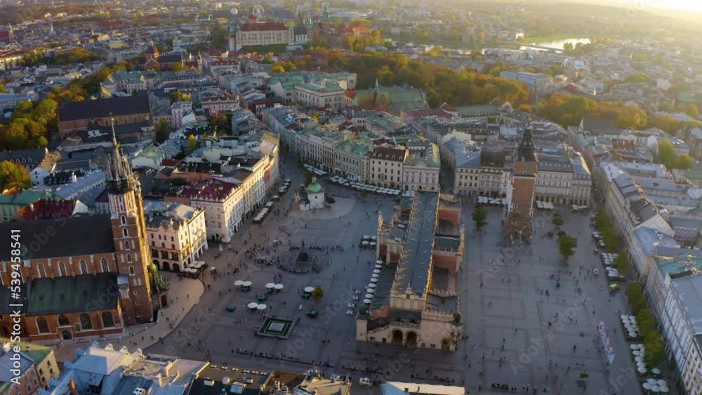 Aerial view of St Mary's Basilica (Mariacki Church) in the Old Town of Krakow (Cracow), Poland, central Europe. Aerial. St. Mary's Basilica church at the Market square in Krakow. Poland. Old city. 