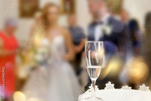 A glass of champagne for young couple at a wedding party