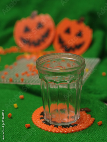 Craft for kids from thermo plastic. Halloween thermo mosaic pumpkins