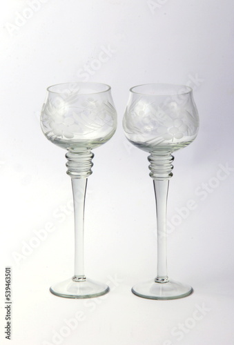 two glasses of champagne for the bride and groom on a white background