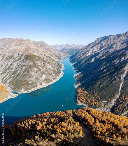 autumn aerial view of Livigno lake in Italy