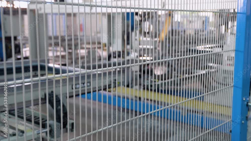 Factory for aluminum and PVC windows and doors production. Details industrial equipment. Background Factory for aluminum and PVC windows and doors production. Details industrial equipment. Background