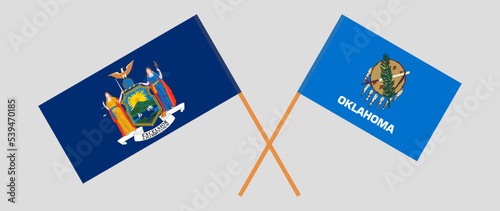Crossed flags of The State of New York and The State of Oklahoma. Official colors. Correct proportion