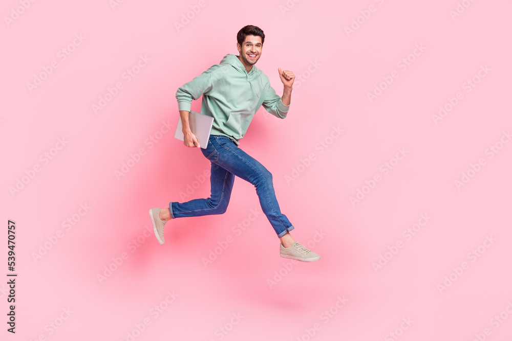 Full length photo of overjoyed man wear trendy clothes move empty space hurry work business meeting isolated on pink color background Full length photo of overjoyed man wear trendy clothes move empty space hurry work business meeting isolated on pink color background