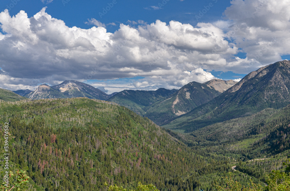 Naklejka premium scenic view of Crystal river valley, Chair Mountain and Ragged Peak from Colorado State Highway 133 near McClure Pass