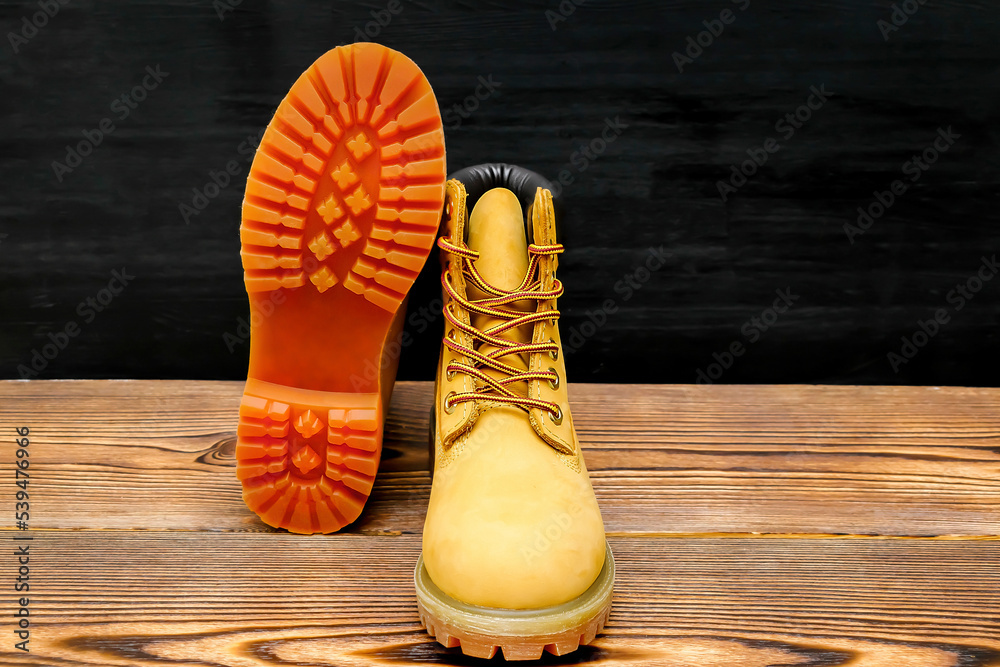 warm mountain winter Timberland tracking shoes, boots, sneakers.Sport  casual footwear concept. Stock Photo | Adobe Stock
