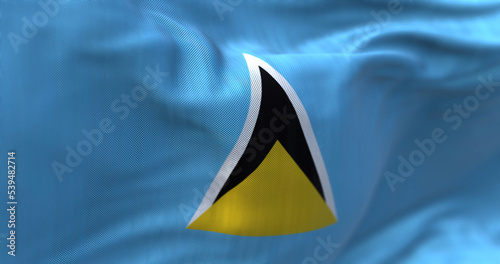 Close-up view of Saint Lucia national flag waving in the wind photo