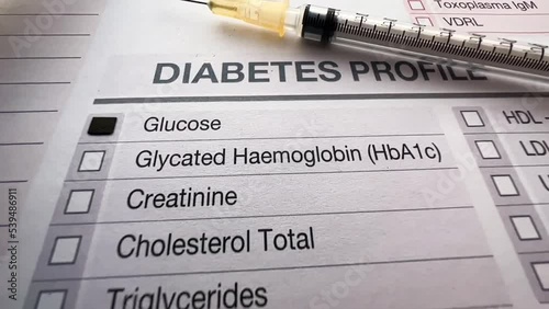 Medical request with result positive to glucose in the diabetes test and syringe insulin for sugar control in blood. medical health report with Test list for diagnosis of diabetes and insulin syringe