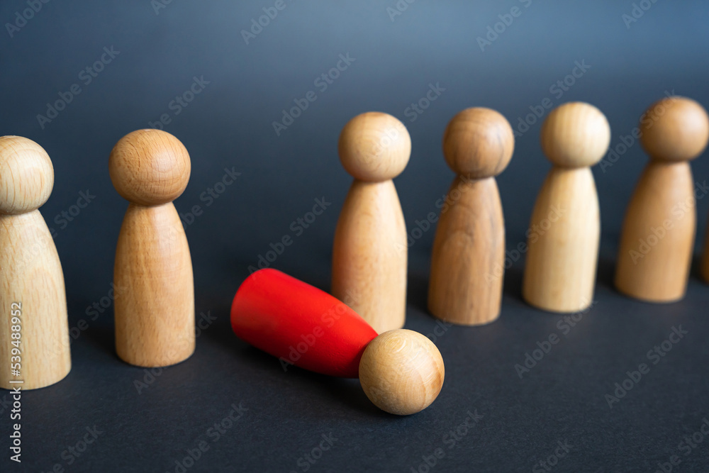 A red man faints out from a row. Weak link. Out of order. Could not stand the load and hardships of work. Test for durability and endurance. Working hard. Health problems. Burnout at work. A red man faints out from a row. Weak link. Out of order. Could not stand the load and hardships of work. Test for durability and endurance. Working hard. Health problems. Burnout at work.