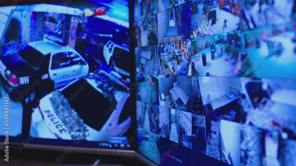 Video surveillance system screen in a office . The seat of the security operator. Monitor with video output from several CCTV cameras. Picture in picture. PIP. Spying on visitors in parking or store Video surveillance system screen in a office . The seat of the security operator. Monitor with video output from several CCTV cameras. Picture in picture. PIP. Spying on visitors in parking or store