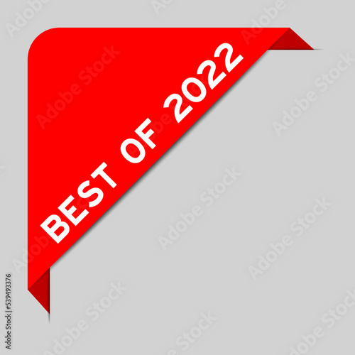 Red color of corner label banner with word best of 2022 on gray background