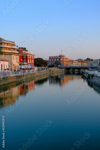 view of the canal of Senigallia  Italy on the sunset over the architecture. Urban view. City postcard