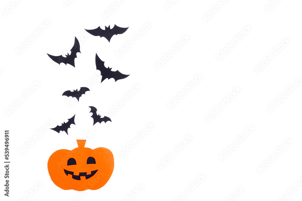Happy halloween pumpkin smile and bats make from black paper cut on white background, Decorative Halloween concept Happy halloween pumpkin smile and bats make from black paper cut on white background, Decorative Halloween concept