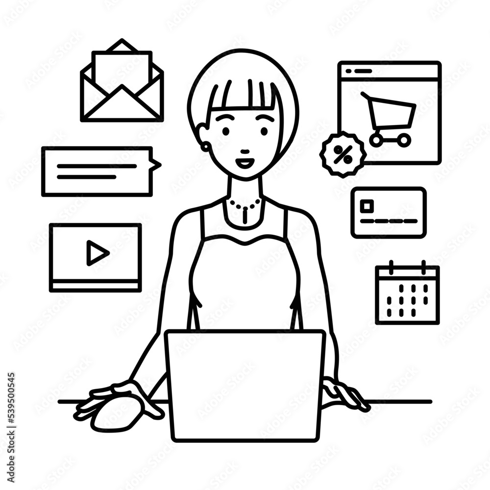 デスクで座ってPCでネットショップやマーケティングの仕事をしているドレスの女性