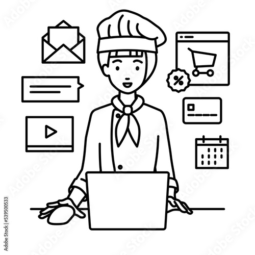 デスクで座ってPCでネットショップやマーケティングの仕事をしている調理師の女性