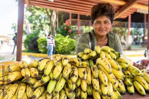 Latin woman selling fruits on the street. Self-employment in Nicaragua, Central America