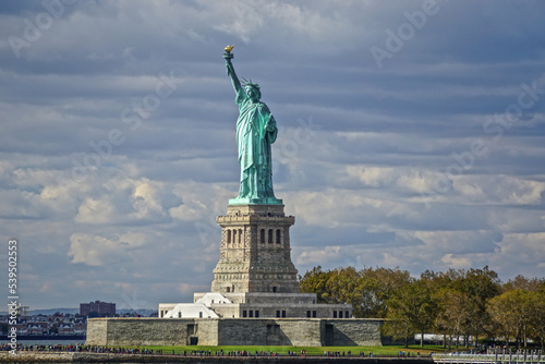 The Statue of Liberty on Liberty Island in New York Harbor. A gift from the people of France to the people of the United States. Designed by Frédéric Auguste Bartholdi and built by Gustave Eiffel. photo